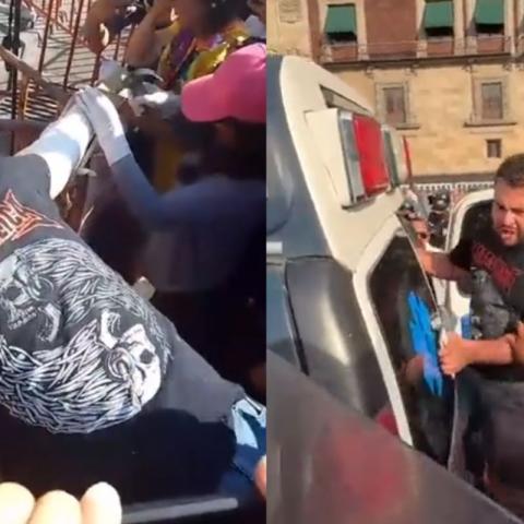 [VIDEO] Activista clava su mano en una cruz frente a Palacio Nacional exigiendo justicia