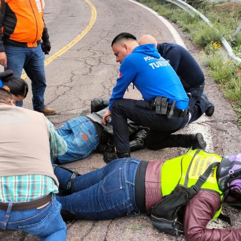 motociclistas heridos