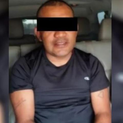 Policía detenido 