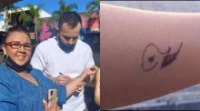 Fan hidrocálida se tatúa la firma de Carín León 