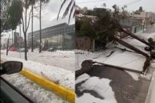 Fuerte lluvia y granizo caen sobre la capital de Puebla 