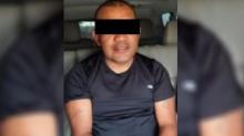 Policía detenido 