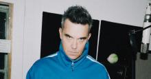 Robbie Williams va por la historia: está a punto de romper un récord de The Beatles