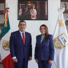 Tere Jiménez y titular del INM